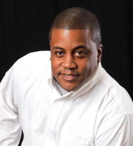 headshot of muss sterrett, an it specialist and microsoft teams expert.